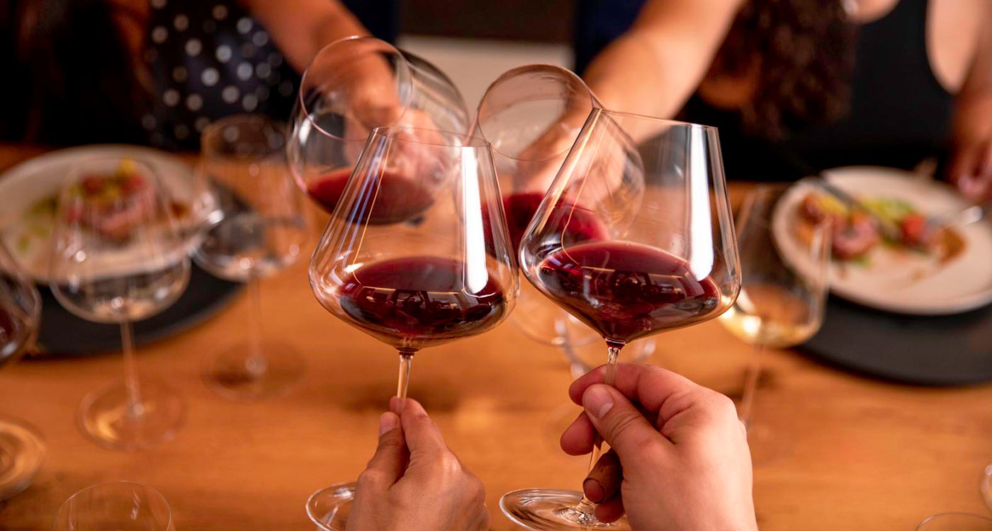 People enjoying a glass of wine